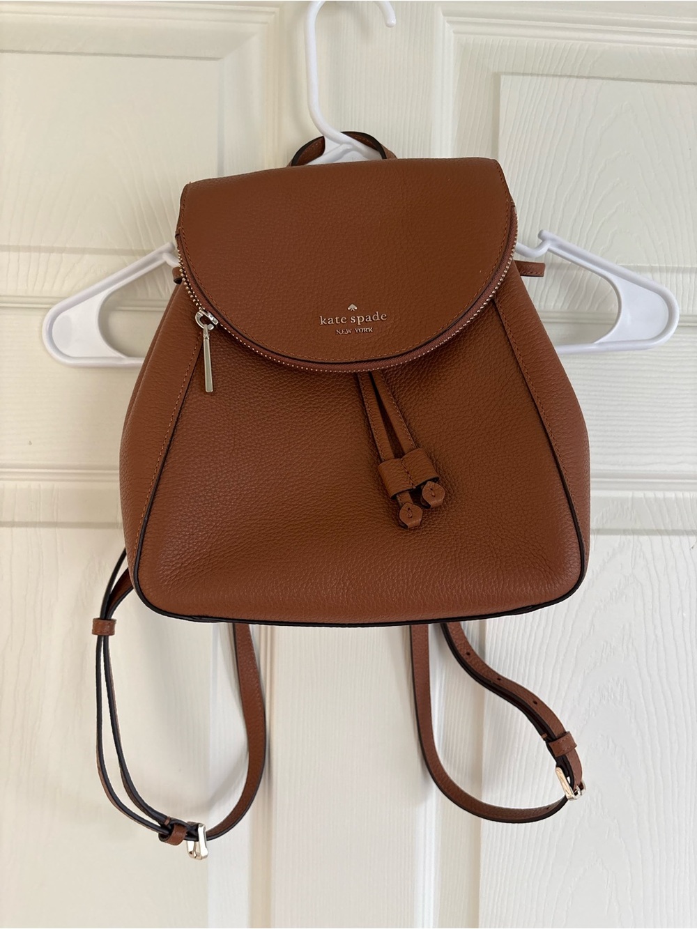 Brand new and never used Kate Spade Brown Pebbled Leather Mini Backpack